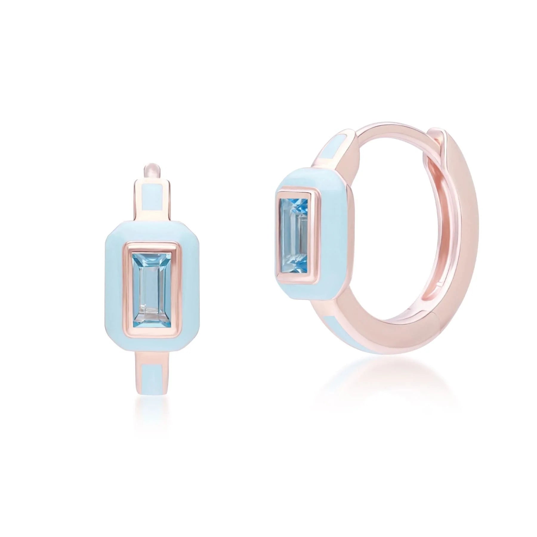 Pair of earrings with blue gemstones and rose gold accents on a white background