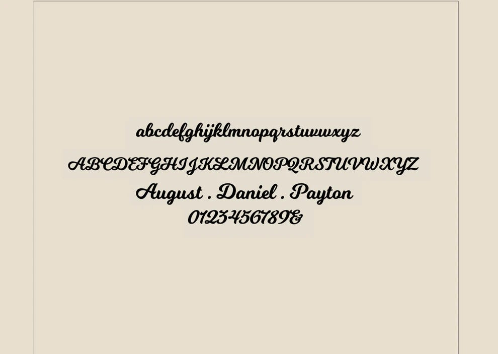 Display of a cursive font on a beige background