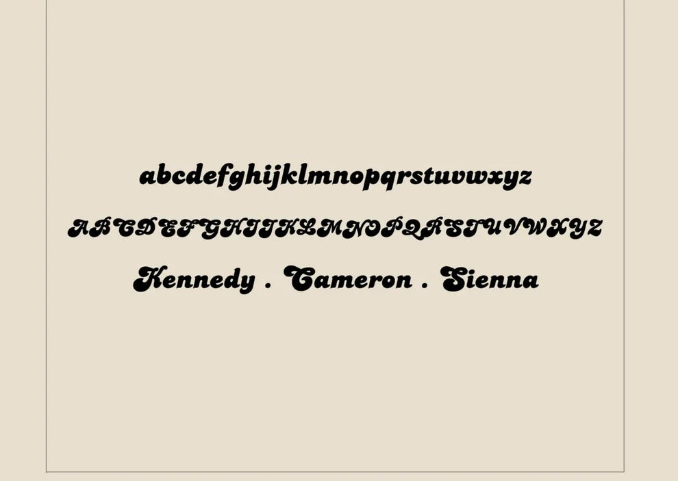 Display of a decorative font with the alphabet and names 'Kennedy', 'Cameron', 'Sienna' on a beige background.